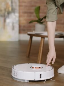 A robotic vacuum cleaner in a cozy living room setting, capturing the essence of modern home convenience.