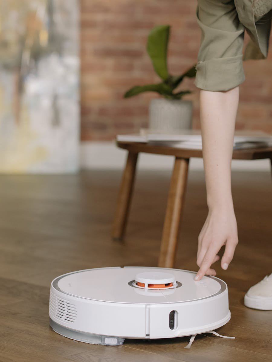 A robotic vacuum cleaner in a cozy living room setting, capturing the essence of modern home convenience.
